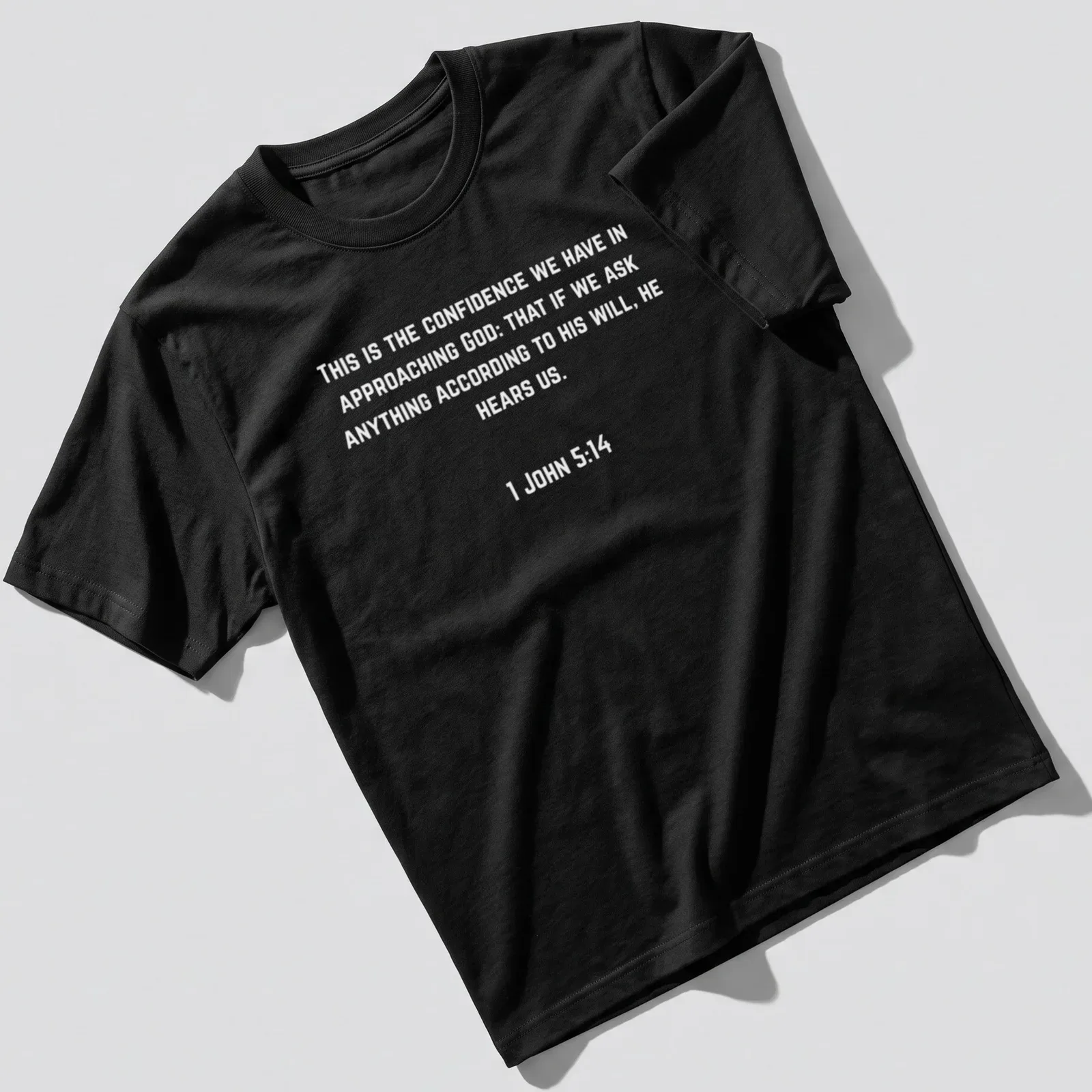 Typography t-shirt featuring '1 John 514 Confidence In The Lord' text design — printed on a unisex t-shirt