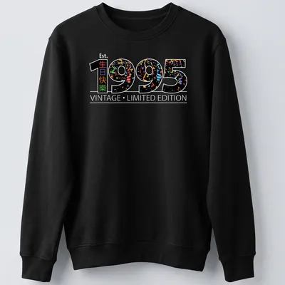 Colorful confetti design with '生日時快樂 1995' on a black — printed on a unisex sweatshirt