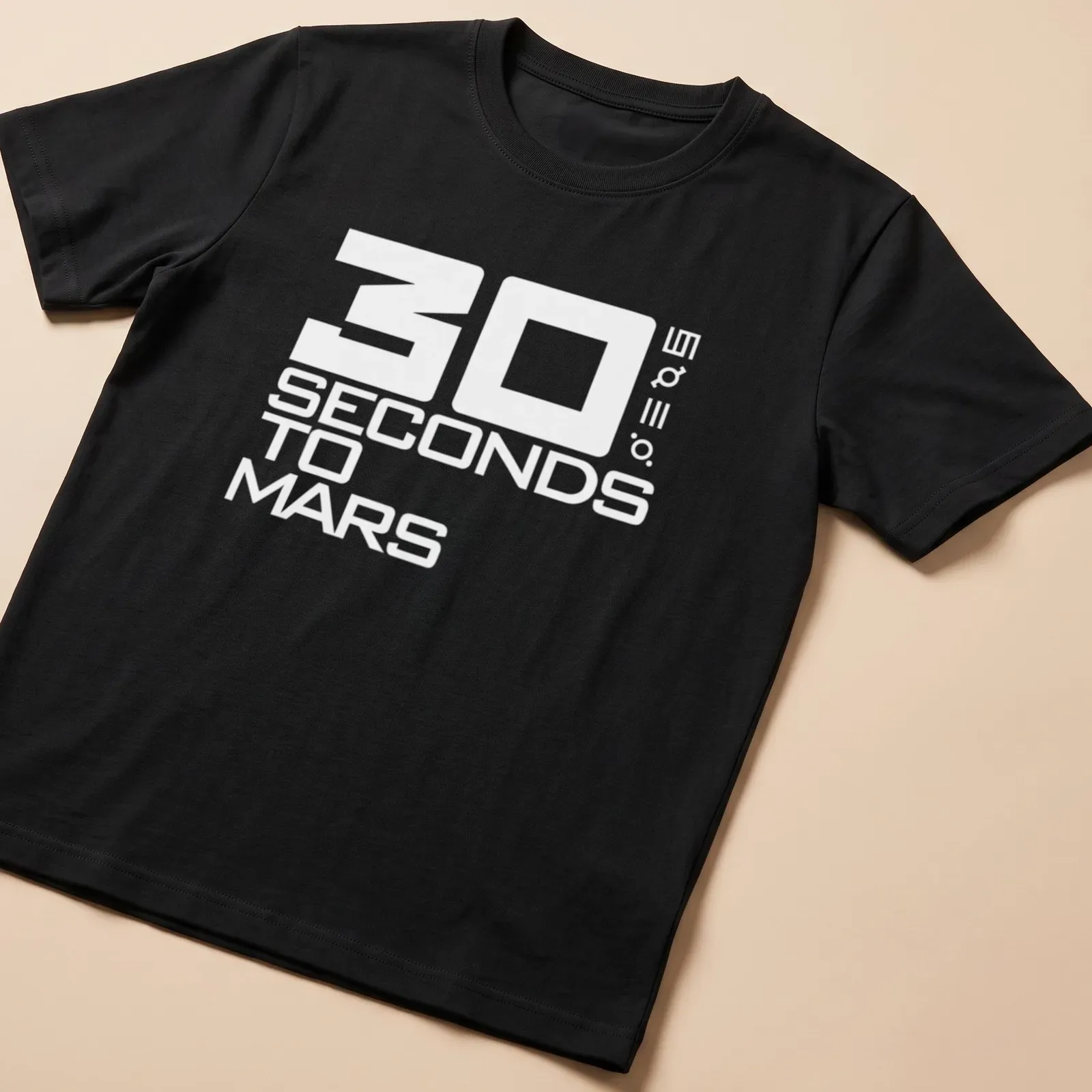 Bold typography design featuring the 30 Seconds To Mars logo in white — printed on a unisex t-shirt
