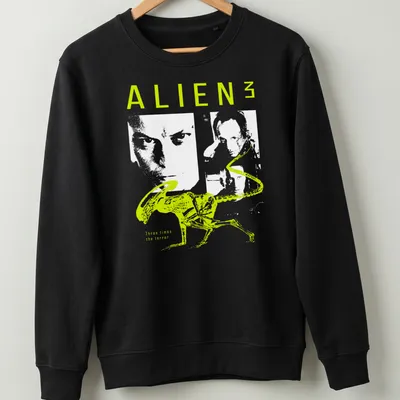 Minimalist graphic of an alien with neon green and white typography — printed on a unisex sweatshirt