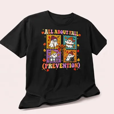 Colorful cartoon ghost with the text about fall prevention for Halloween — printed on a unisex t-shirt (angled view)