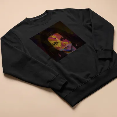 Colorful abstract portrait of a female figure with a vibrant face — printed on a unisex sweatshirt