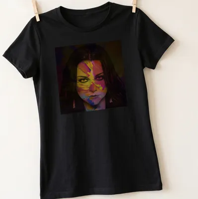 Colorful abstract portrait of a female figure with a vibrant face — printed on a women's shirt