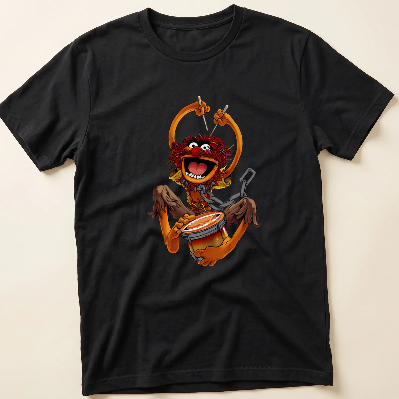 Retro cartoon of Animal from The Muppets playing drums in vibrant colors — printed on a unisex t-shirt