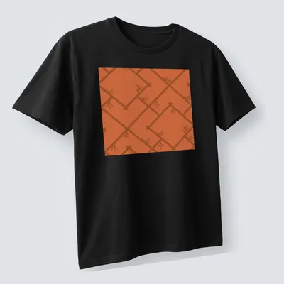 T-shirt featuring a light orange bamboo lattice pattern in modern chinoiserie style — printed on a unisex t-shirt (angled view)