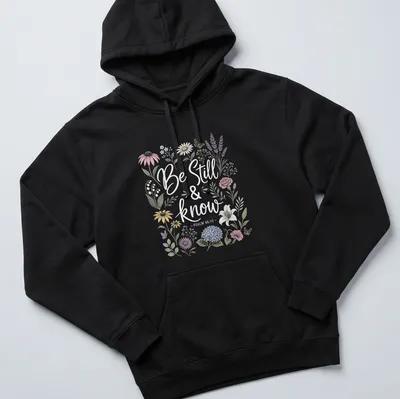 Floral design with the text Be Still & know - PSALM 46:10 in vintage style — printed on a unisex hoodie