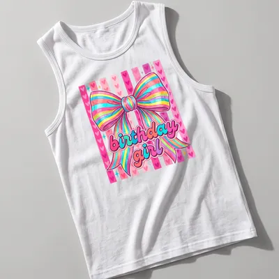 Cute coquette t-shirt with colorful rainbow bow and birthday girl text — printed on a tank top