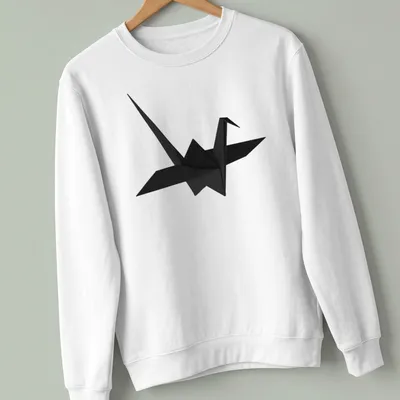 Minimalist black origami crane illustration on a — printed on a unisex sweatshirt