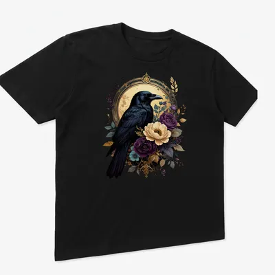 Gothic floral design featuring a black raven with colorful elements — printed on a unisex t-shirt (angled view)