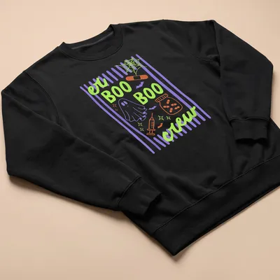 Playful cartoon design of a ghost, medical elements, and bats with 'er BOO BOO crew' text — printed on a unisex sweatshirt