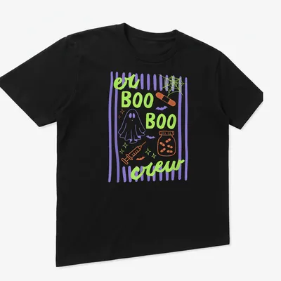 Playful cartoon design of a ghost, medical elements, and bats with 'er BOO BOO crew' text — printed on a unisex t-shirt (angled view)