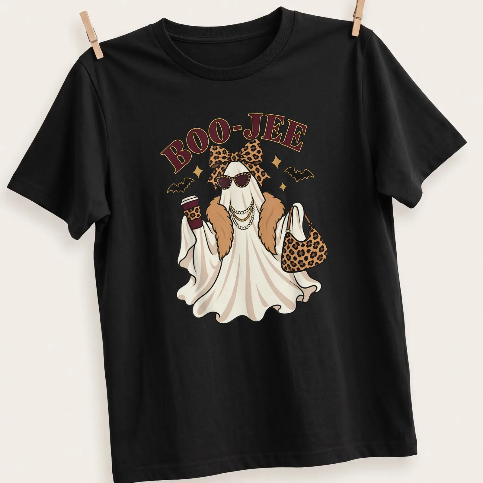 Kawaii ghost with leopard accessories and BOO-JEE text in white and gold — printed on a unisex t-shirt