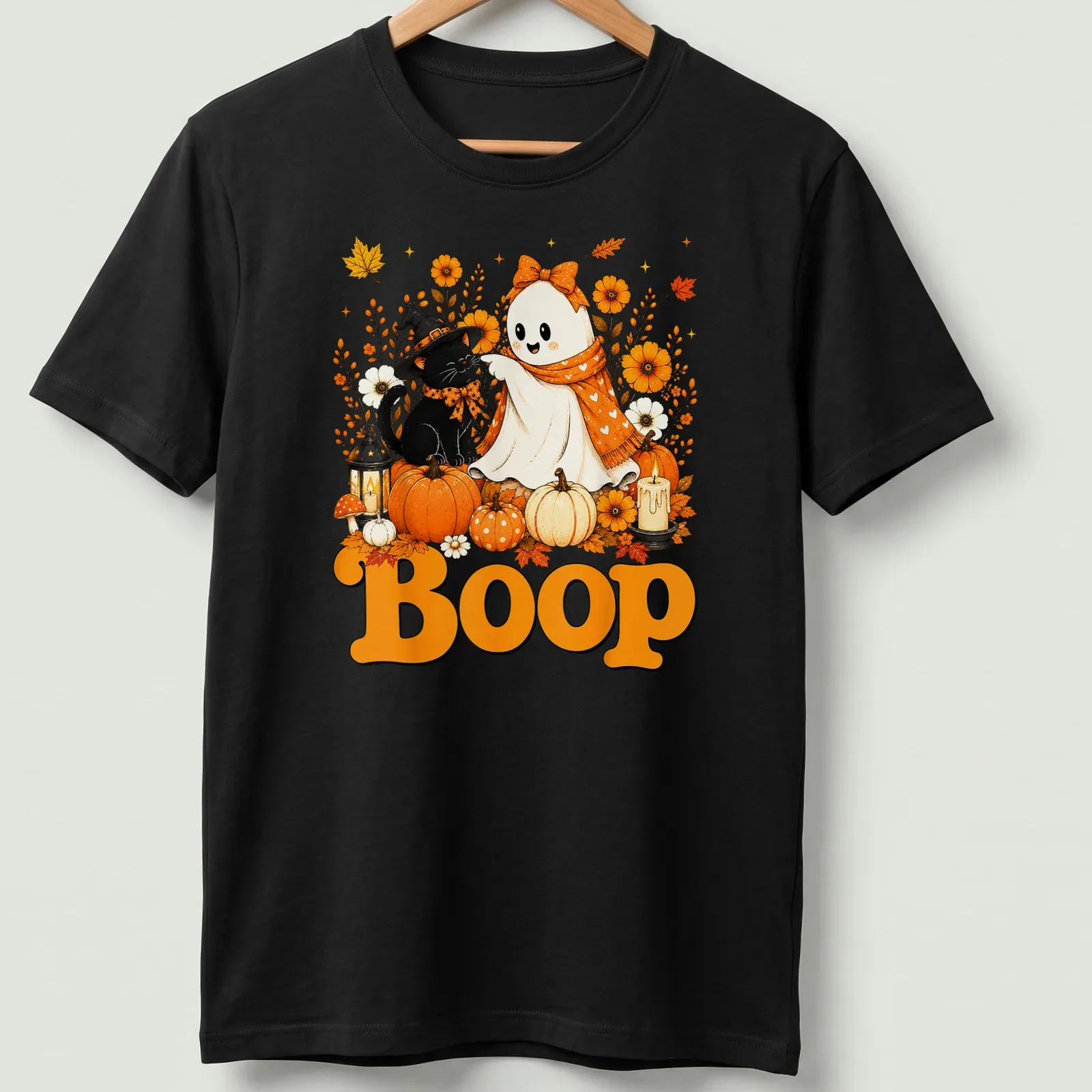 Kawaii illustration of a cute ghost and black cat with 'Boop' text in a Halloween theme — printed on a unisex t-shirt