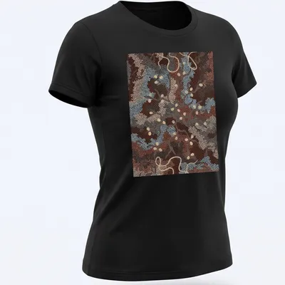 Abstract nature patterns in dot painting style with 'Bush Tucker Dreaming' text. — printed on a women's shirt