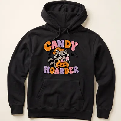 Kawaii cartoon raccoon with pumpkin basket and candy in orange, purple, and pink — printed on a unisex hoodie