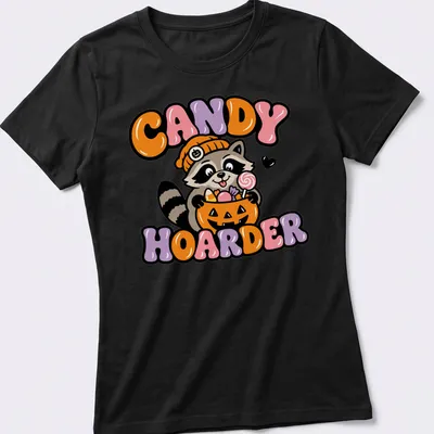 Kawaii cartoon raccoon with pumpkin basket and candy in orange, purple, and pink — printed on a women's shirt