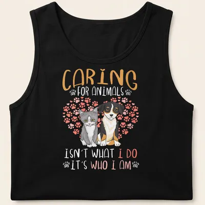 Illustrative design featuring a gray cat and dog with a heartfelt message on caring for animals — printed on a tank top