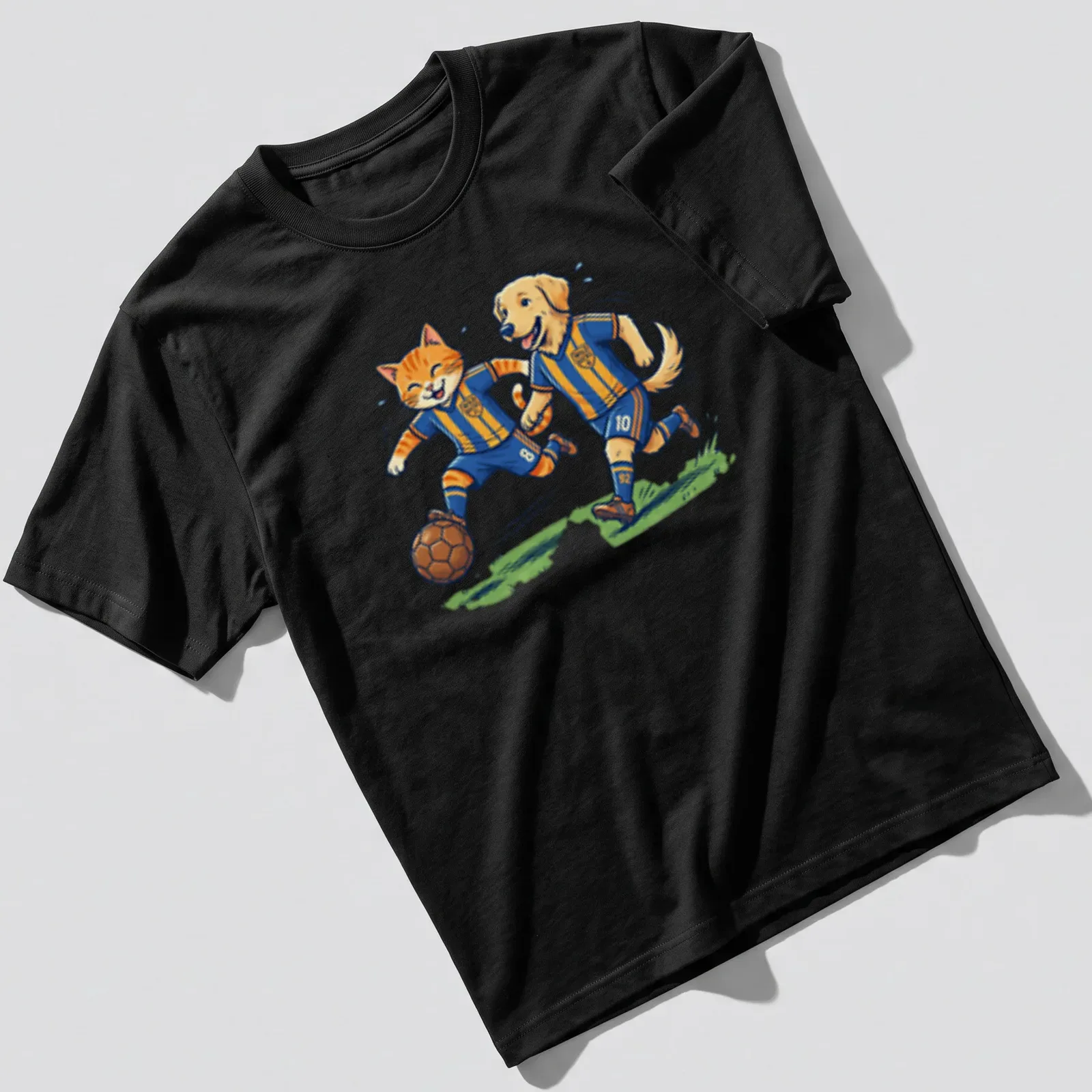 Vintage cartoon design of a cat and dog playing soccer in vibrant colors — printed on a unisex t-shirt