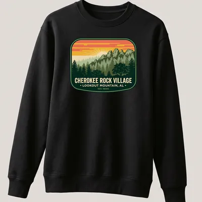 Vintage badge tee with mountain landscape and trees in green, orange, yellow, and blue — printed on a unisex sweatshirt