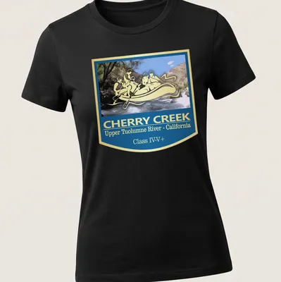 Vintage badge style T-shirt featuring a whitewater rafting scene with bold lettering — printed on a women's shirt