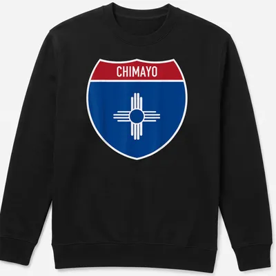 Chimayo New Mexico shirt featuring a shield design with bold lettering — printed on a unisex sweatshirt