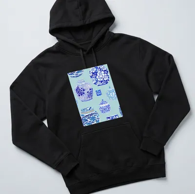 Watercolor print of elegant ginger jars in ice blue tones — printed on a unisex hoodie