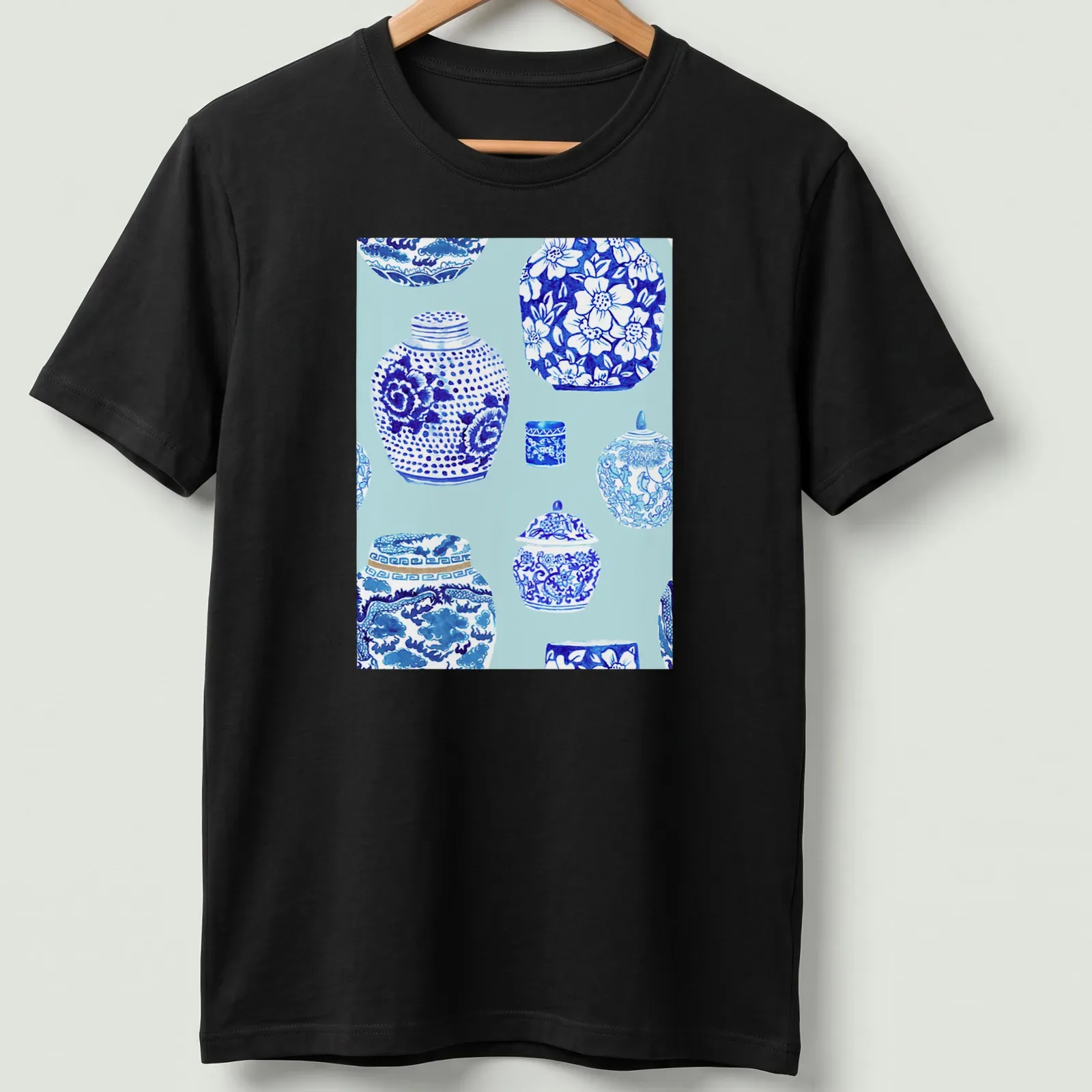 Watercolor print of elegant ginger jars in ice blue tones — printed on a unisex t-shirt