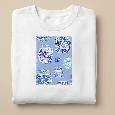 Watercolor illustration of ginger jars in blue and white tones — printed on a unisex sweatshirt