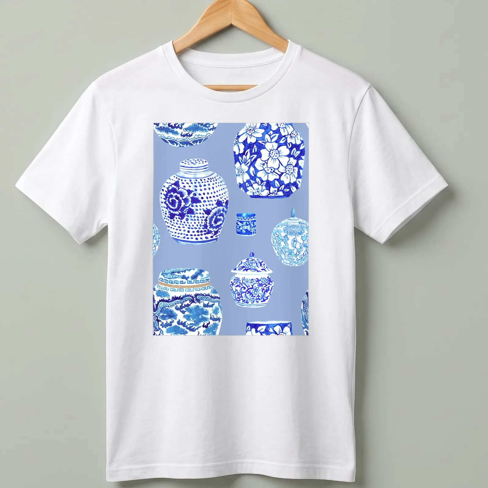 Watercolor illustration of ginger jars in blue and white tones — printed on a unisex t-shirt