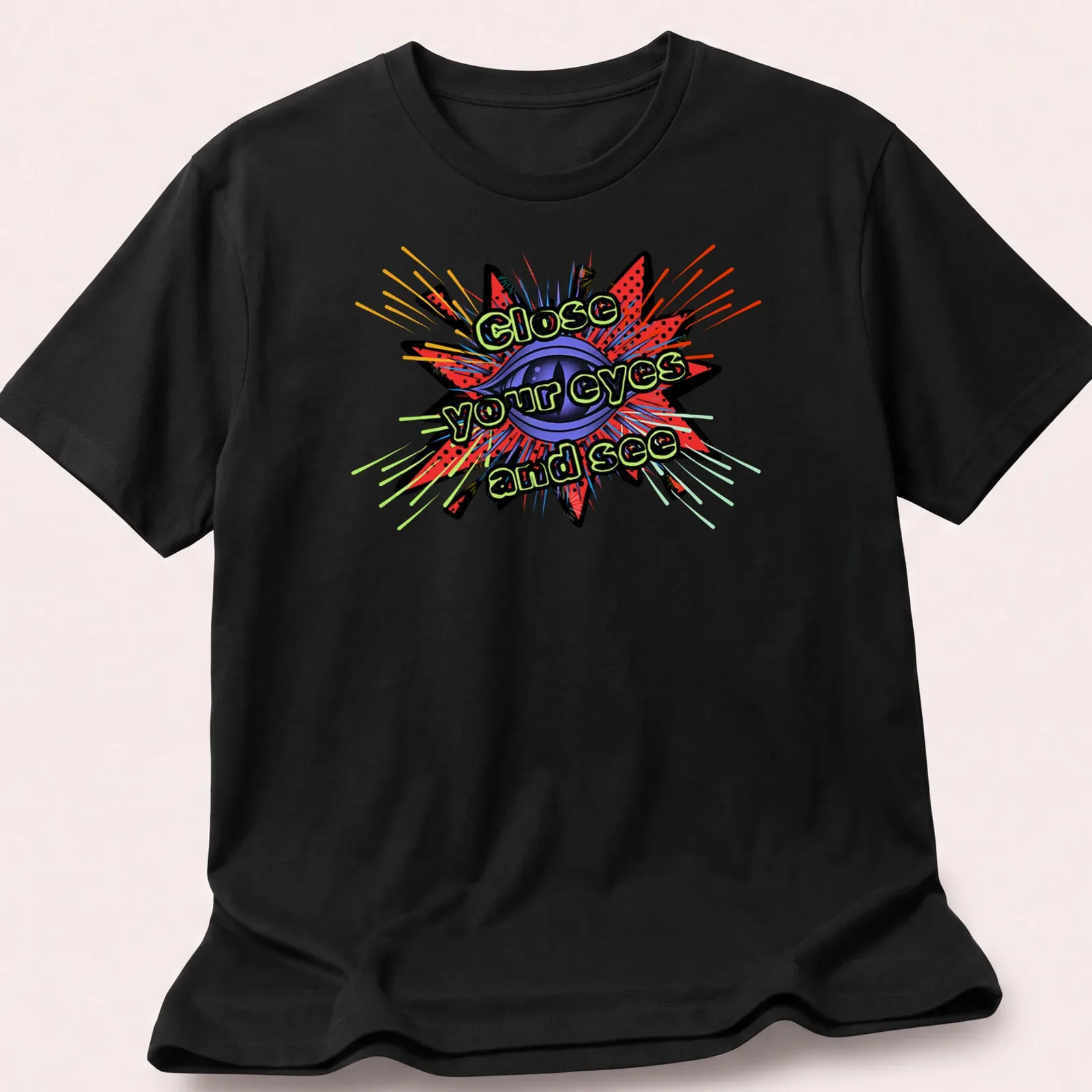 Inspirational T-shirt with bold text and an eye graphic bursting with colorful rays — printed on a unisex t-shirt