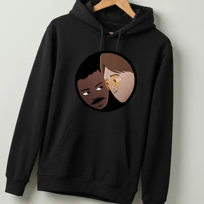 Cartoon illustration of two characters, Copano and Harrington, in playful colors — printed on a unisex hoodie