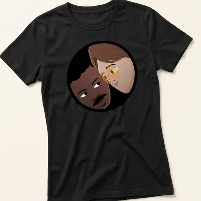 Cartoon illustration of two characters, Copano and Harrington, in playful colors — printed on a women's shirt