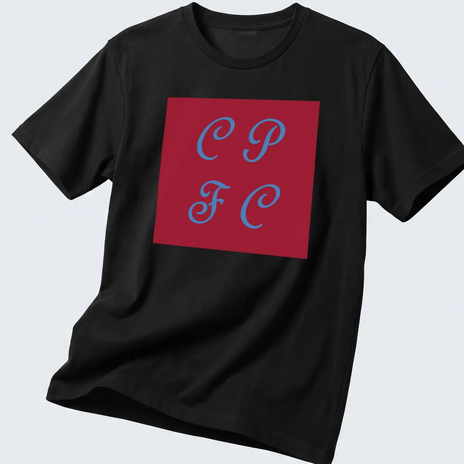 Modern minimalist CPFC logo t-shirt in red and blue with bold lettering — printed on a unisex t-shirt