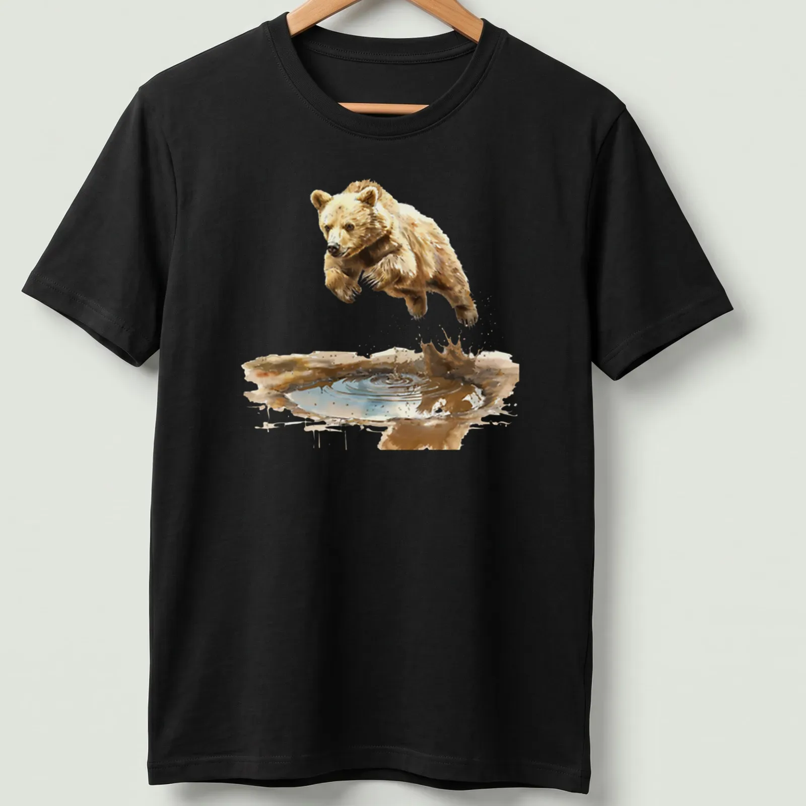 Watercolor graphic of a cute bear cub jumping over water — printed on a unisex t-shirt