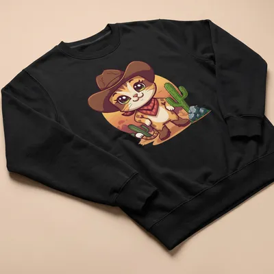 Kawaii cowboy cat surrounded by cacti in a whimsical desert setting — printed on a unisex sweatshirt