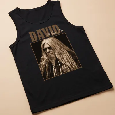 Vintage David Allan Coe t-shirt with distressed typography in brown and beige — printed on a tank top