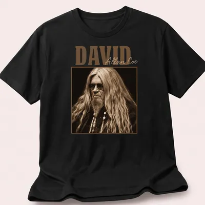 Vintage David Allan Coe t-shirt with distressed typography in brown and beige