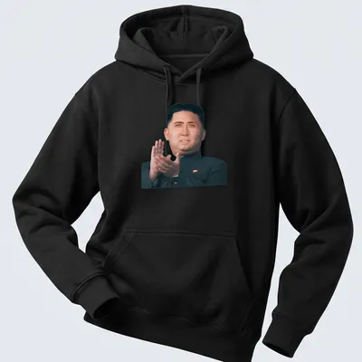 Photomontage of a dictator's portrait in skin tones, black, and red. — printed on a unisex hoodie