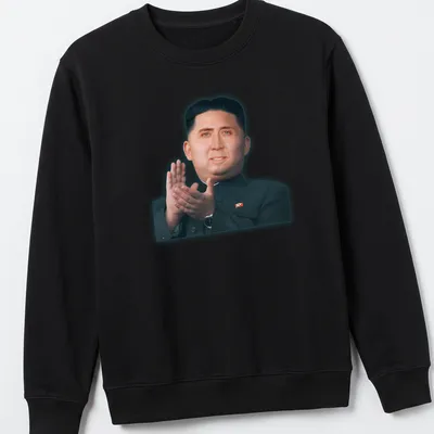 Photomontage of a dictator's portrait in skin tones, black, and red. — printed on a unisex sweatshirt