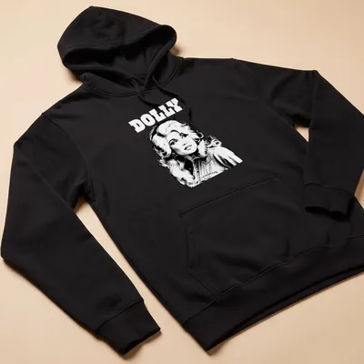 Vintage style t-shirt featuring Dolly Parton in black, white, and gray — printed on a unisex hoodie