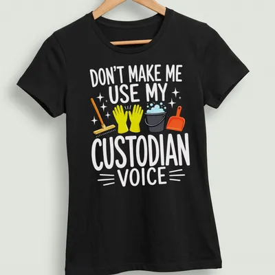 Colorful cartoon t-shirt with cleaning tools and the phrase Don't Make Me Use My Custodian Voice — printed on a women's shirt