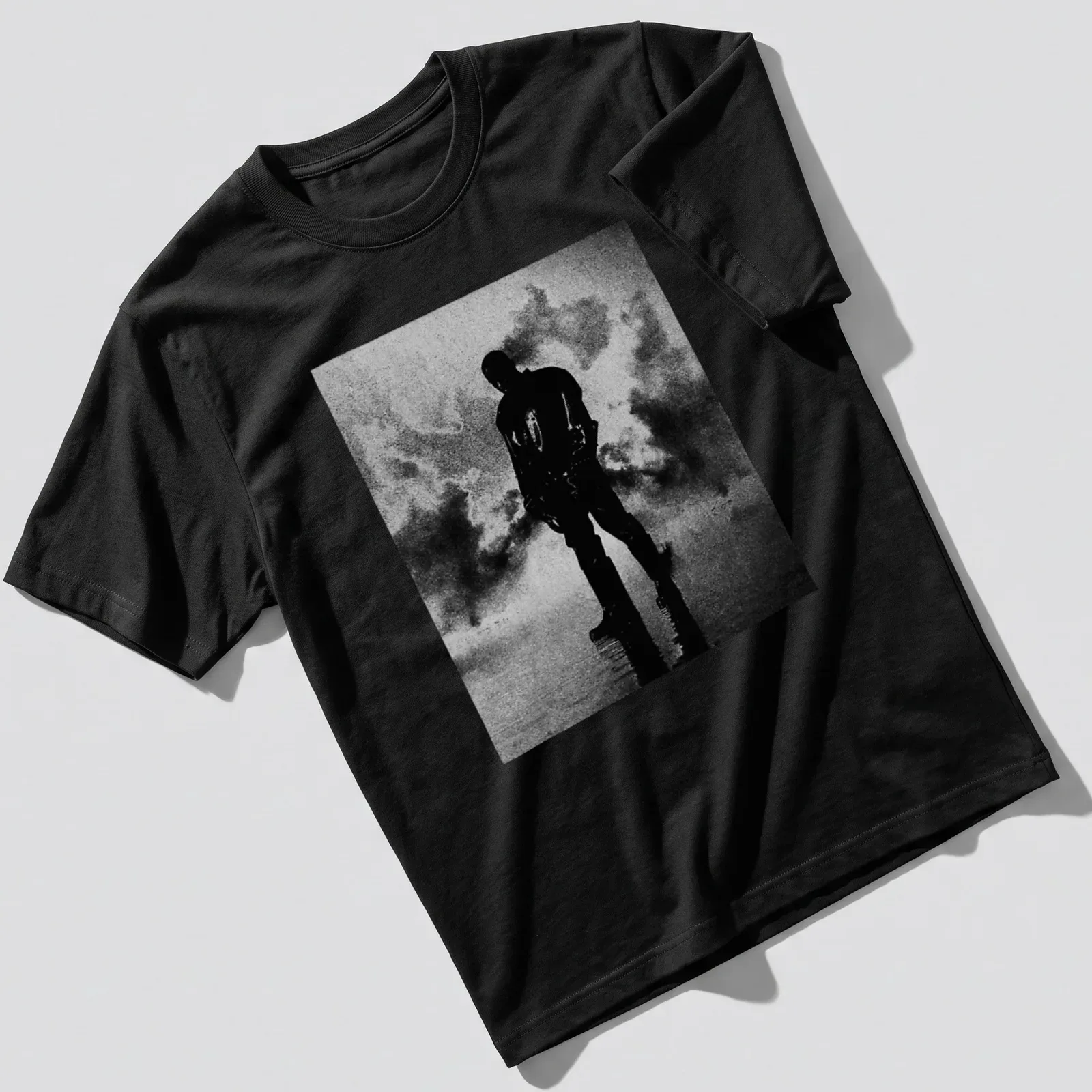 High contrast black and white silhouette of a man on a — printed on a unisex t-shirt