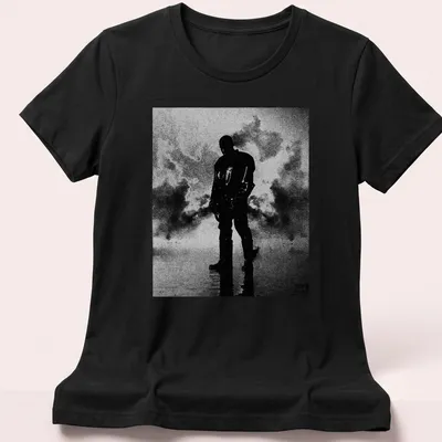 High contrast black and white silhouette of a man on a — printed on a women's shirt