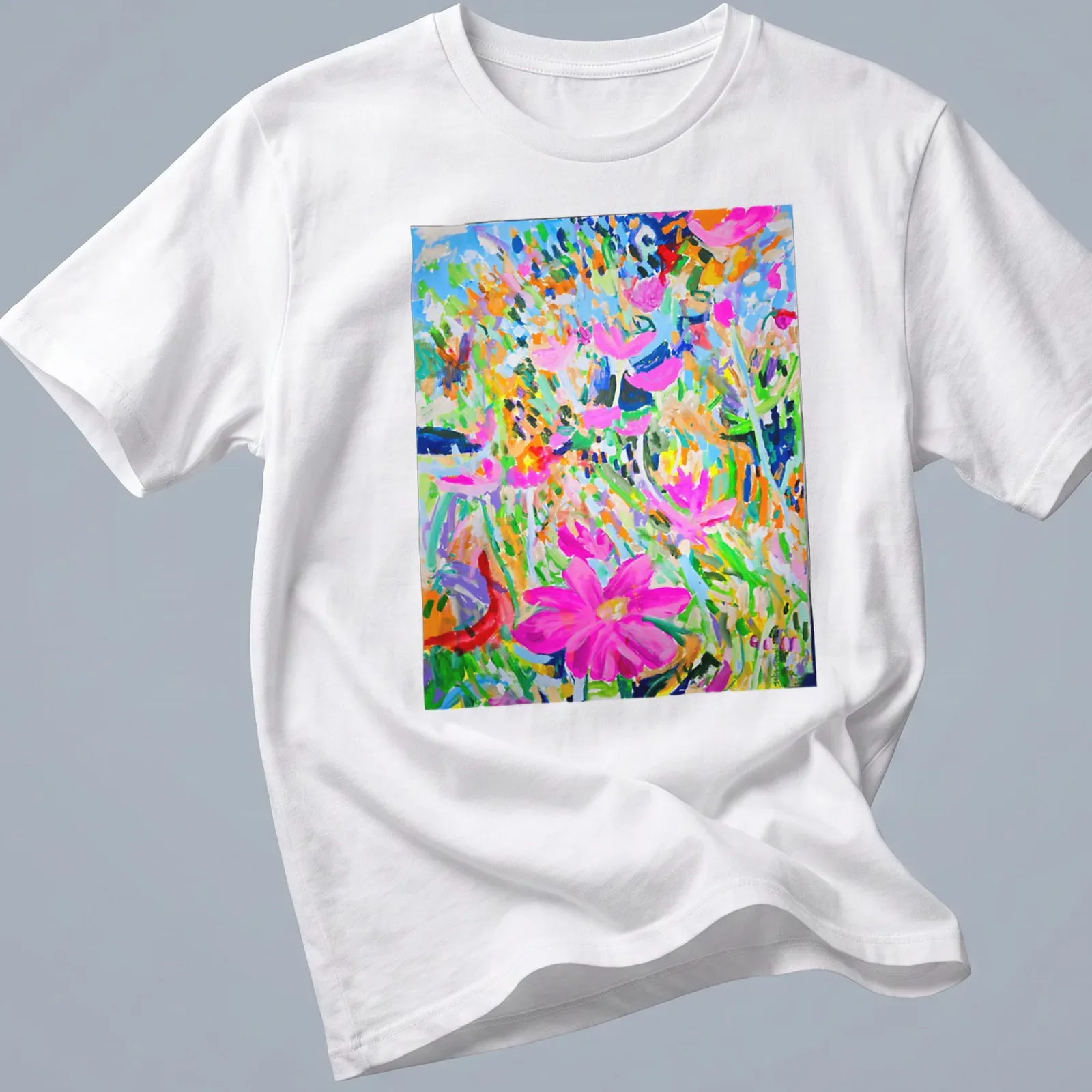 Abstract illustration of colorful flowers in pink, blue, green, orange, and purple — printed on a unisex t-shirt