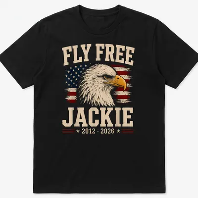 Eagle design with vintage distressed text 'Fly Free Jackie 2012 - 2026' on American flag background