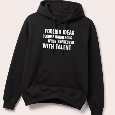 Bold typography t-shirt displaying the phrase about foolish ideas and talent. — printed on a unisex hoodie