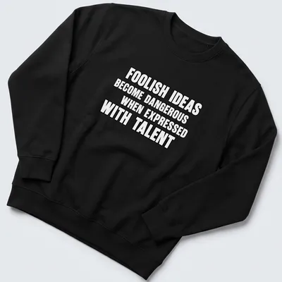 Bold typography t-shirt displaying the phrase about foolish ideas and talent. — printed on a unisex sweatshirt