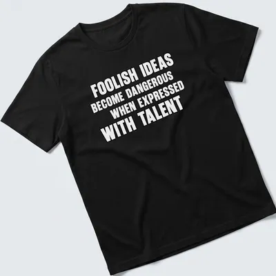 Bold typography t-shirt displaying the phrase about foolish ideas and talent.