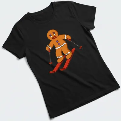 Cartoon gingerbread man skiing with red scarf against colorful background — printed on a women's shirt