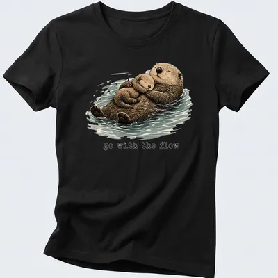 Watercolor otter family design with the phrase Go With The Flow — printed on a women's shirt